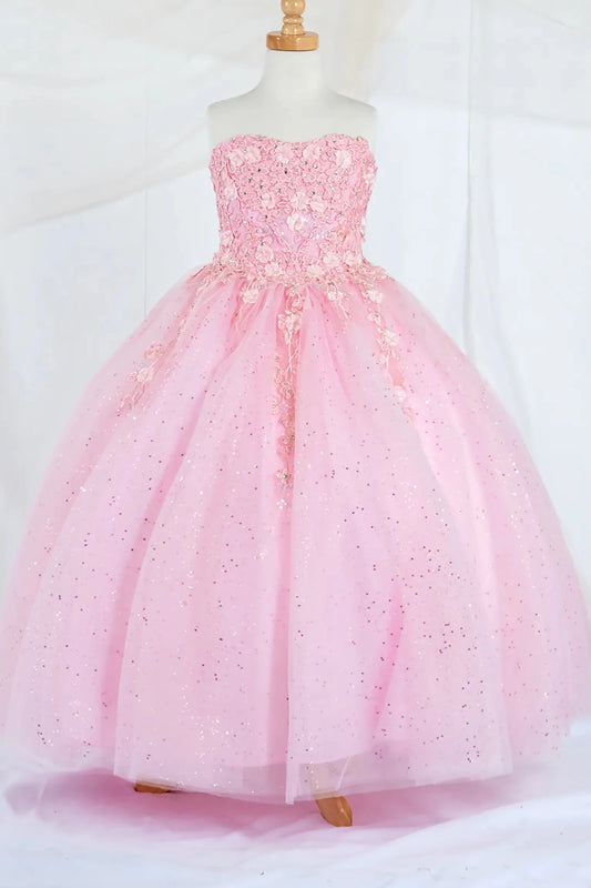 Front-facing display of a bubble-pink mini quince dress featuring a strapless 3D floral appliqué bodice and a full glitter tulle layered skirt.