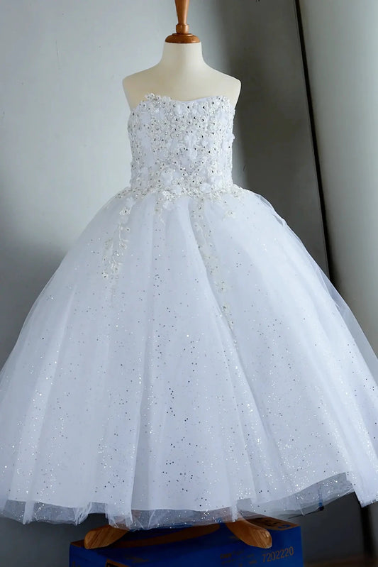 Ffront-facing in stunning blush pink mini quince dress with 3D flower appliqué bodice and glitter tulle layered skirt.