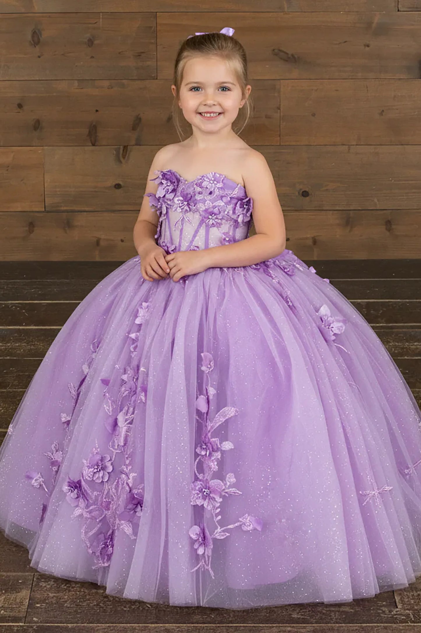 Front view of enchanting lilac mini quince dress with 3D floral appliqué bodice and glitter tulle layered skirt.