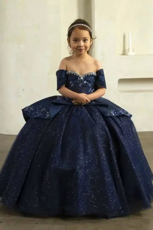 Front view of elegant navy mini quince dress with lace corset bodice and glitter tulle layered skirt.