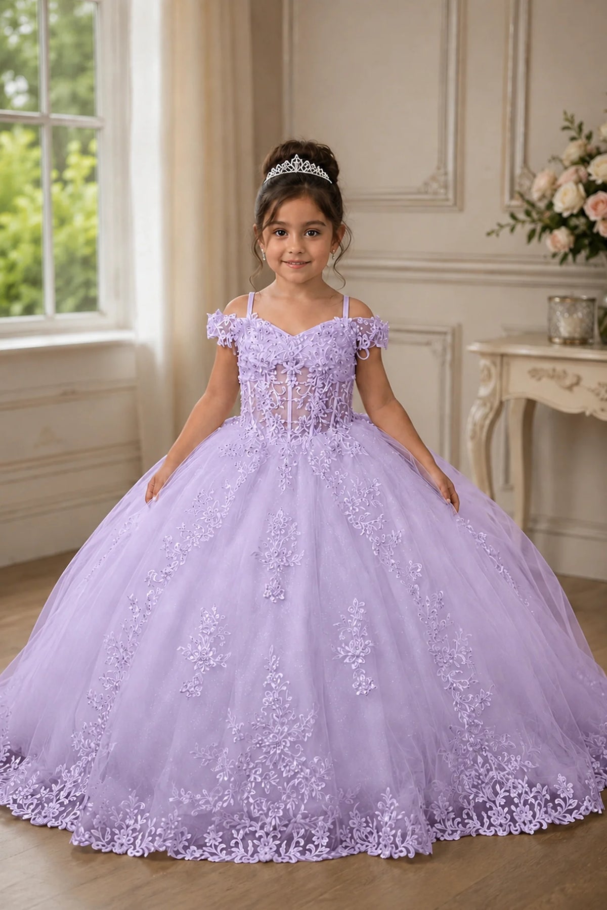 A graceful front view, the Lilac mini quince dress showcases embroidered floral lace bodice and full tulle skirt with a large bow at the back.