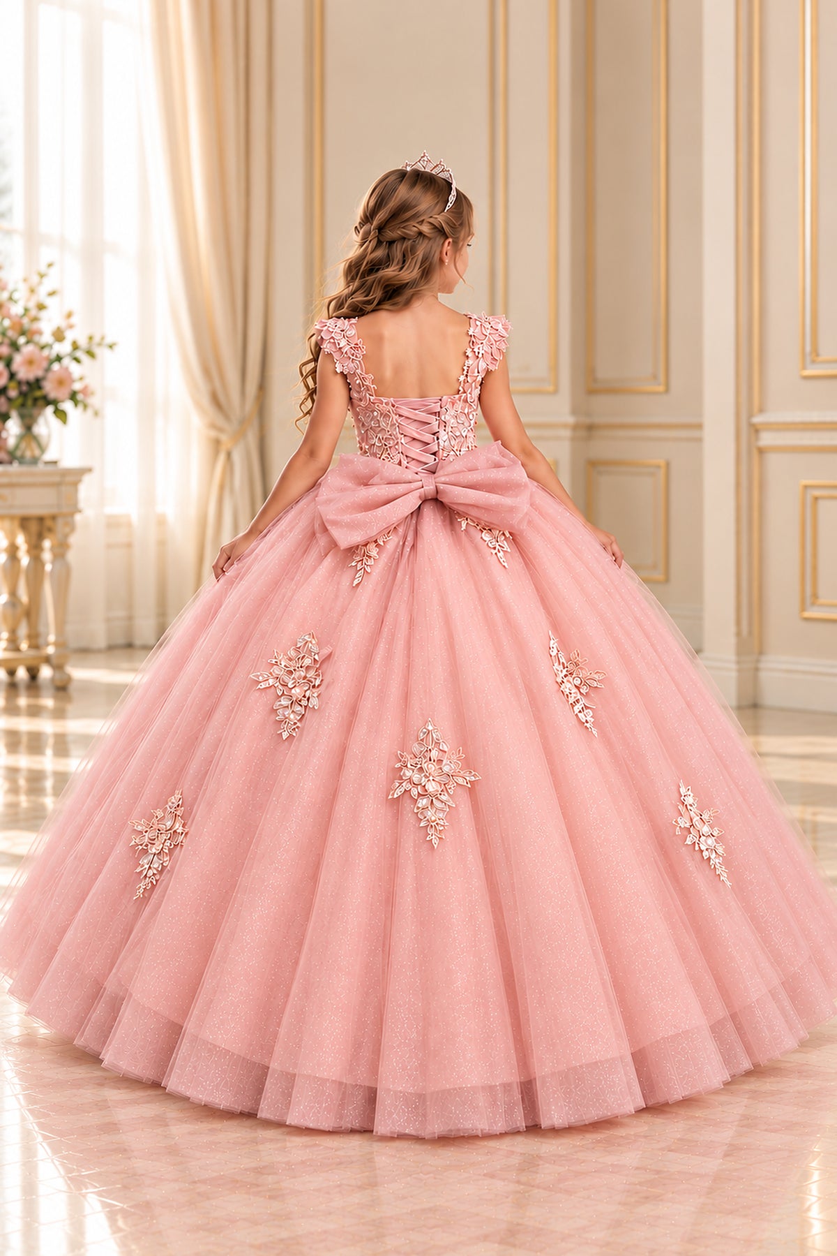 Back of the Mauve floral tulle mini quince and pageant dress showing its lace-up bodice and large bow.