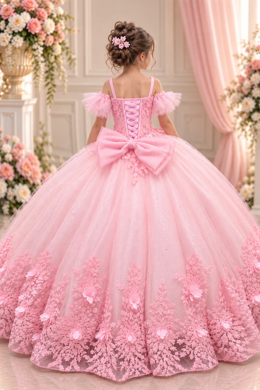 From behind, the Bubble Pink mini quince dress displays its lace-up finish and floral lace trim around the full ball gown skirt.