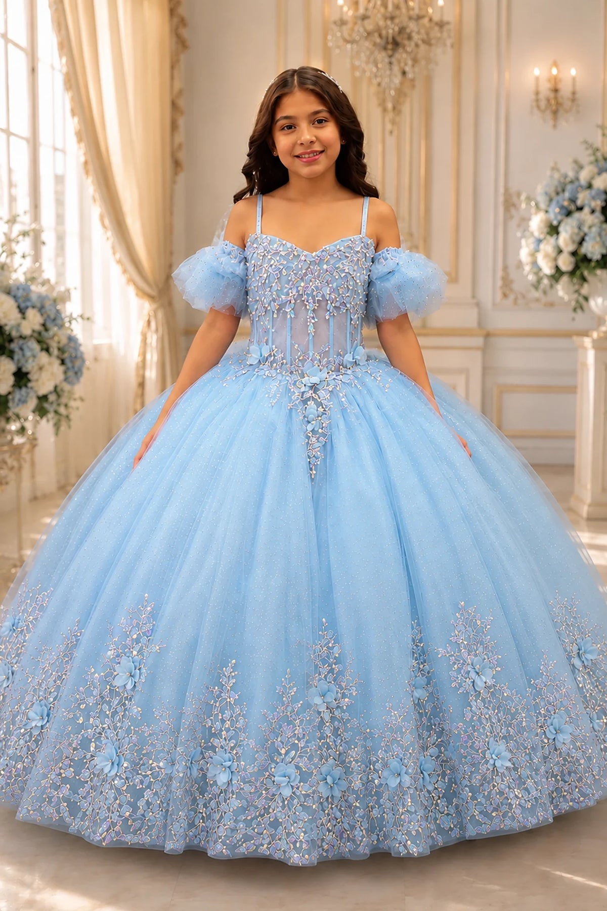 A graceful front view, the Light Blue mini quince dress showcases soft tulle puff sleeves and a lace-up bodice and floral lace trim around the full ball gown skirt.