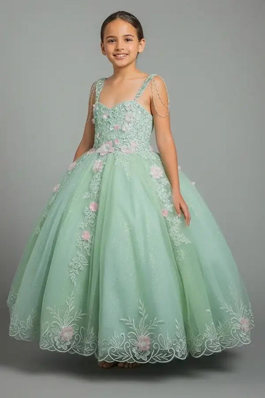 Kid standing front-facing in stunning sage ball gown with beaded fringe bodice, 3D floral appliqués, and voluminous layered skirt