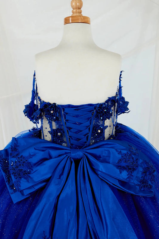 Close-up display highlighting the intricate crystal beadwork on the bodice and the detailed bow accent.