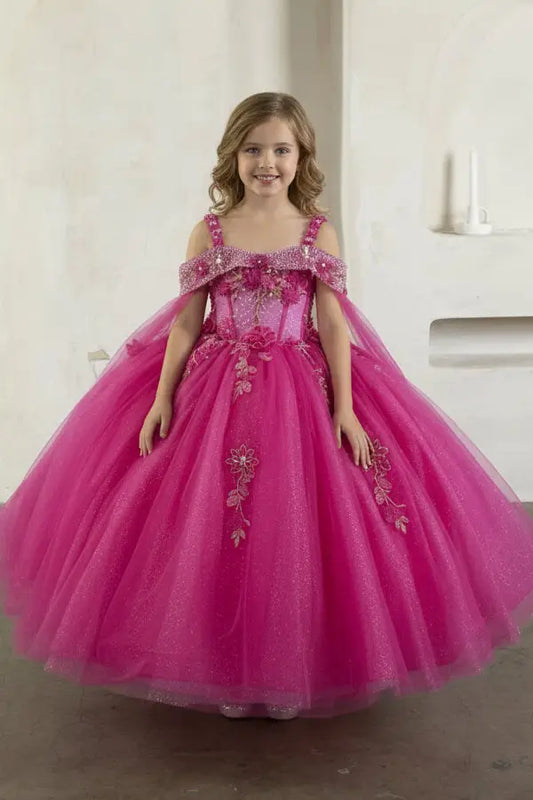hot pink ball gown with sheer embroidered bodice, flowing cape, and layered skirt