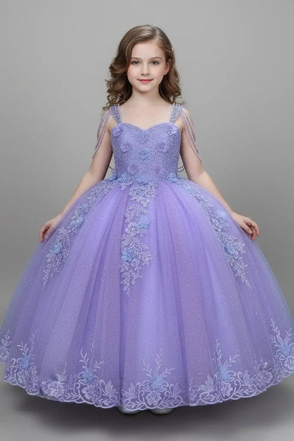 Kid standing front-facing in stunning lilac ball gown with beaded fringe bodice, 3D floral appliqués, and voluminous layered skirt