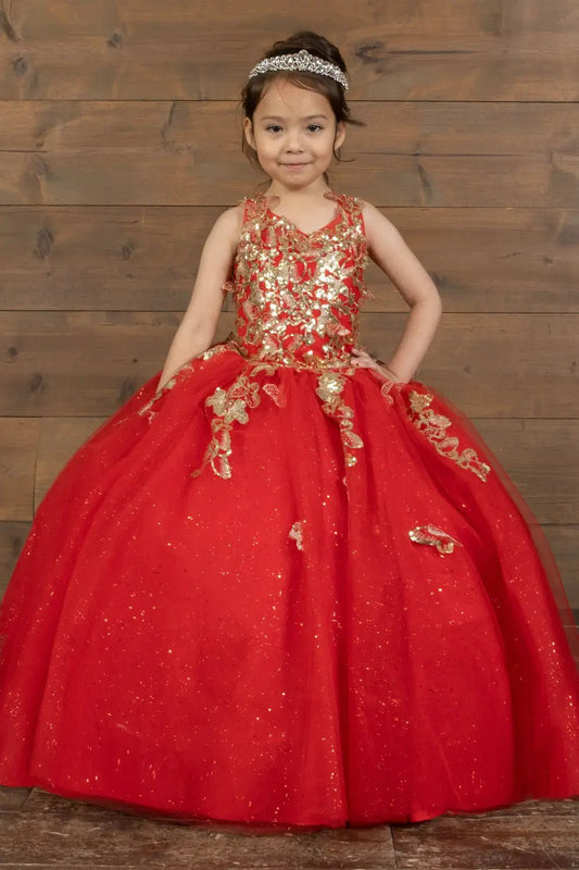 Kid standing front-facing in stunning red ball gown with 3D floral appliqué bodice and glitter tulle layered skirt