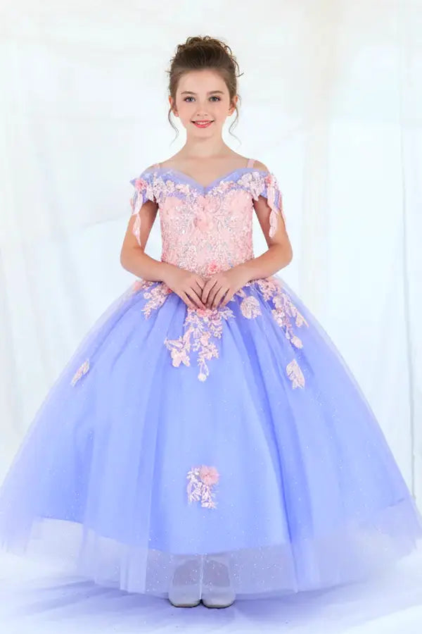 Woman standing front-facing in glamorous Bahama blue ball gown with glitter embroidery bodice, beaded sleeves, and voluminous layered skirt

