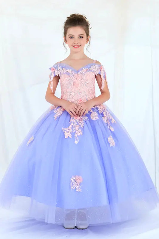 Woman standing front-facing in glamorous Bahama blue ball gown with glitter embroidery bodice, beaded sleeves, and voluminous layered skirt

