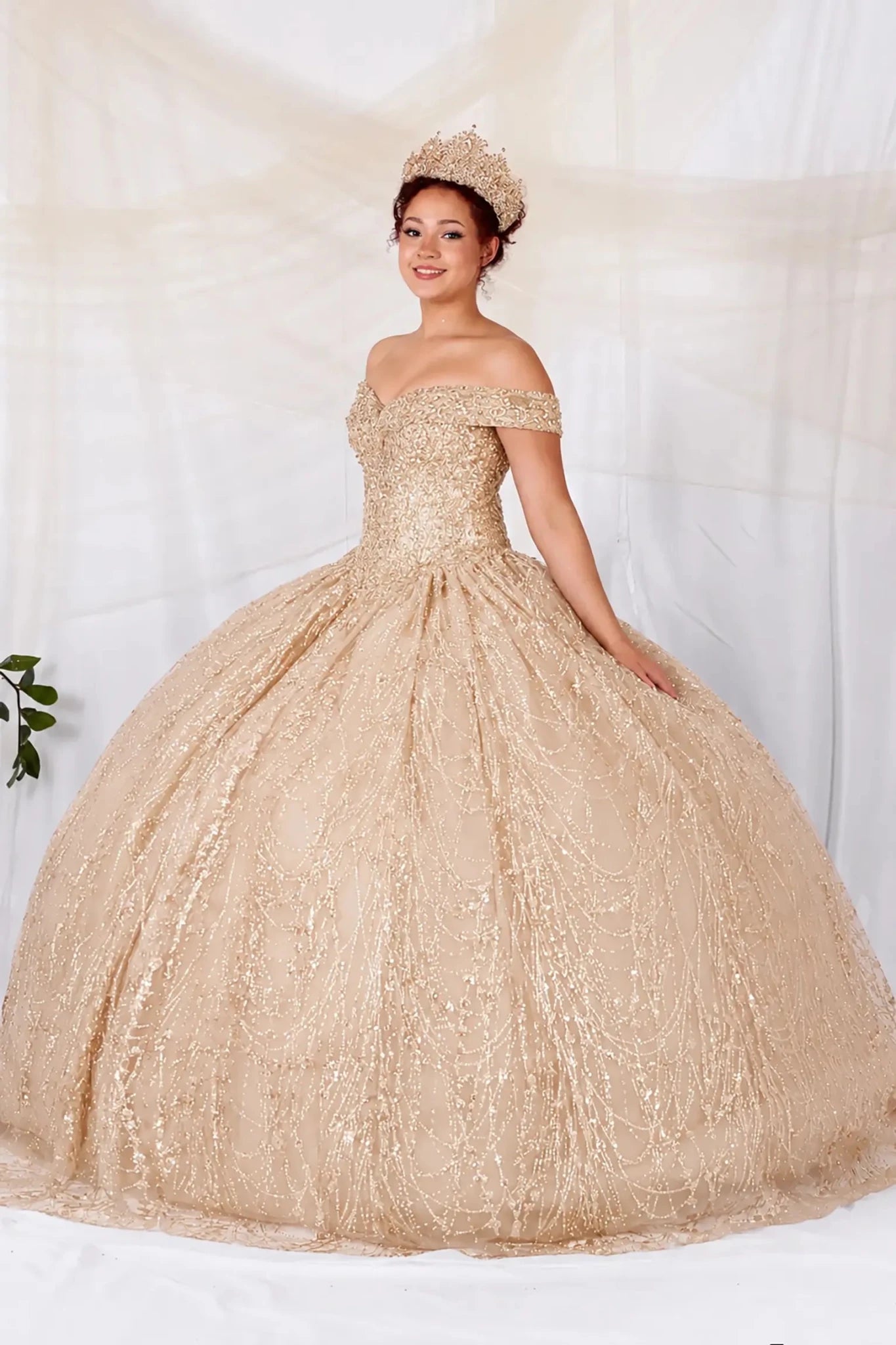 Champagne and gold quinceanera dress with off the shoulder design