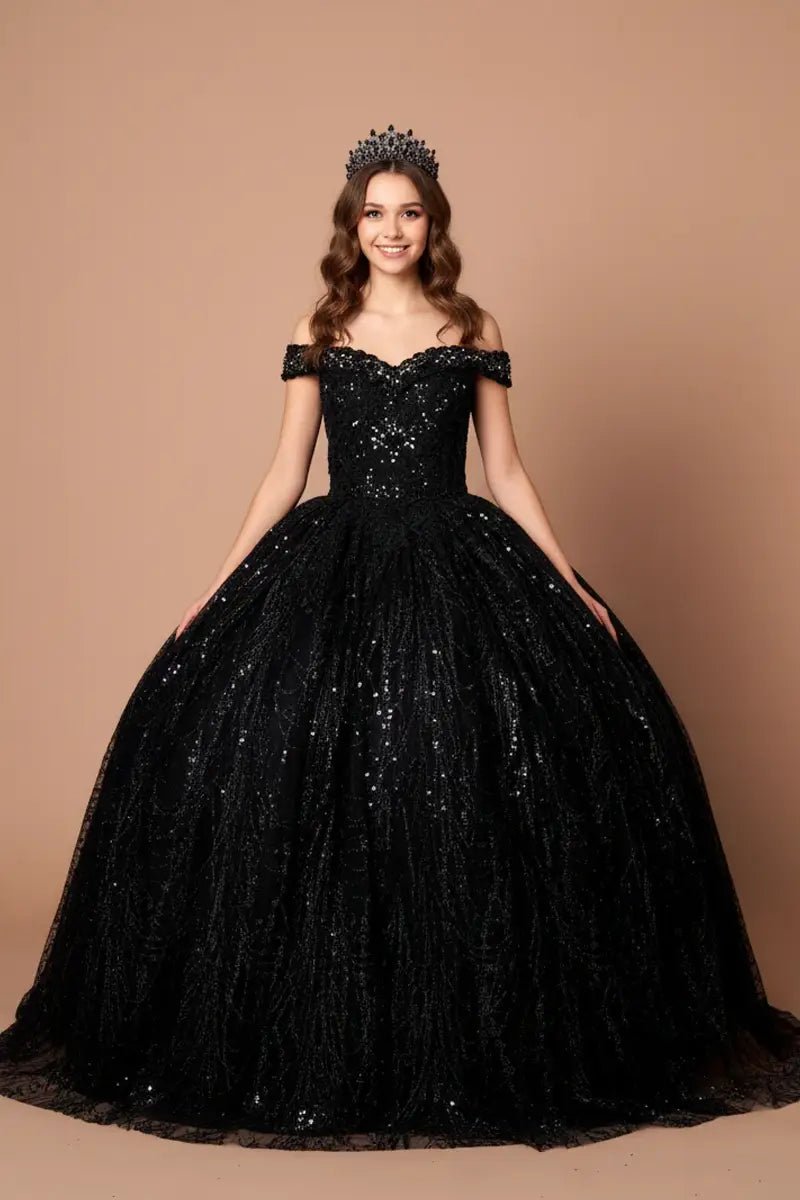 Front-Facing of a woman wearing Black ball gown with off-shoulder neckline sequin embellishments and full flowing skirt complemented by an elegant cape