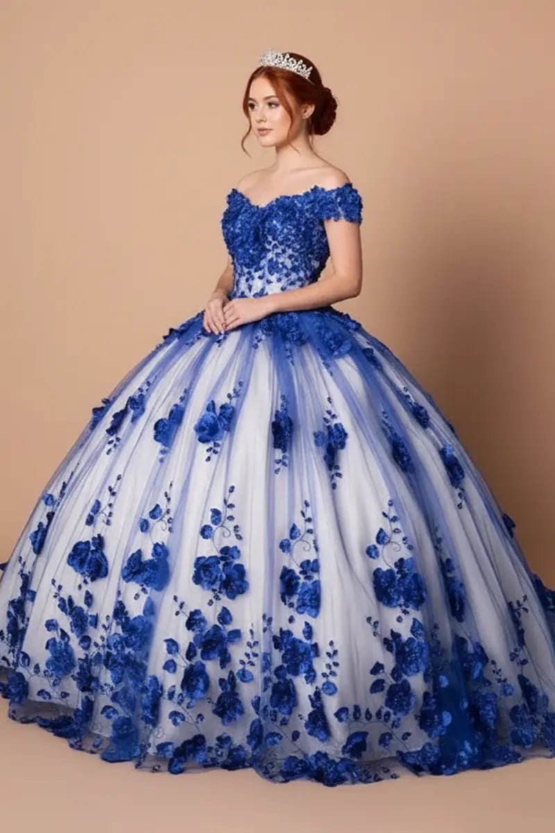 Side View of a woman wearing Deep blue gown with dimensional floral accents off-shoulder styling and airy movement