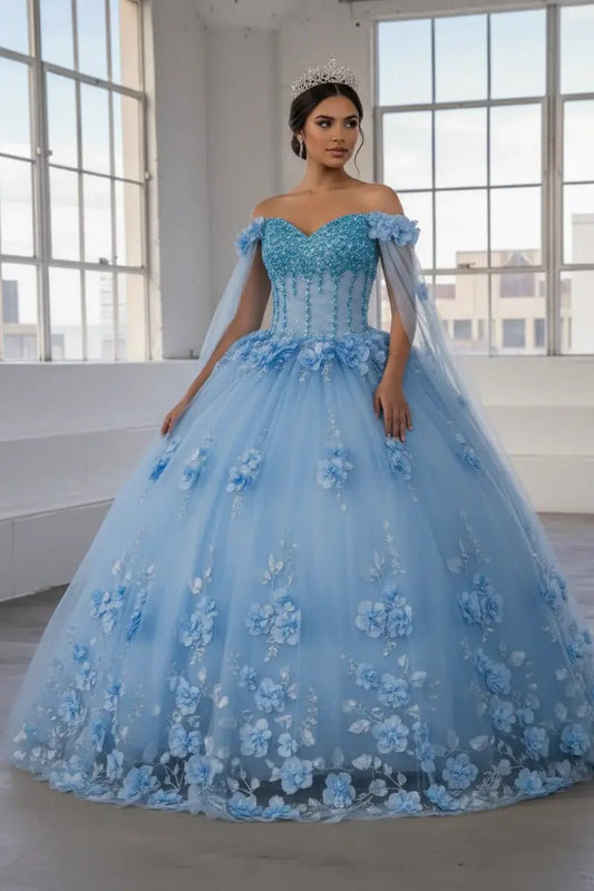 Front-Facing of a woman wearing Light blue ball gown with two-tone design floral embellishment and removable shoulder cape with flowing skirt