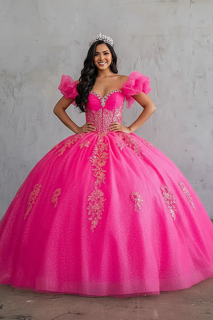 Hot pink ball gown with illusion sweetheart neckline structured corset bodice