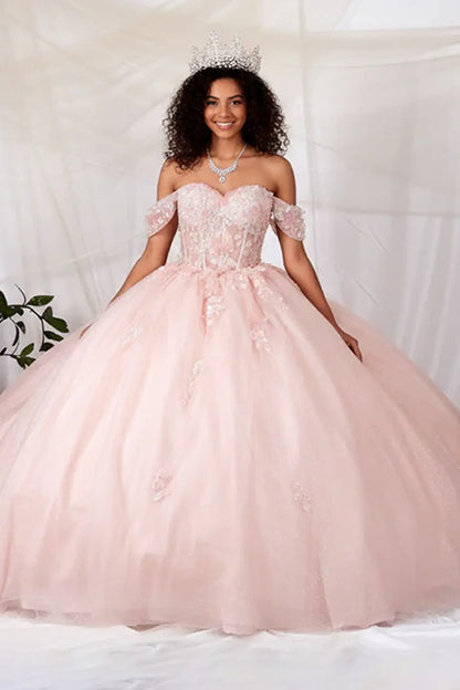 Front-Facing of a woman wearing Blush pink ball gown with sheer bodice 3D butterfly accents and glitter tulle skirt