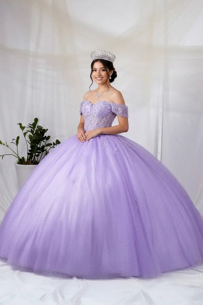 Front-Facing of a woman wearing Lilac ball gown with spaghetti straps sheer bodice 3D butterfly accents and multi-layer lace skirt