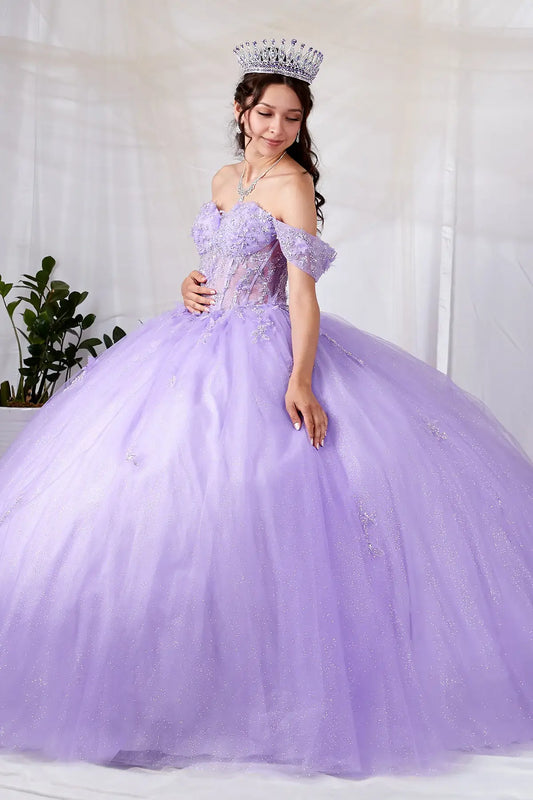 Side View of a woman wearing Soft purple gown with sheer bodice butterfly details and multi-layer lace design
