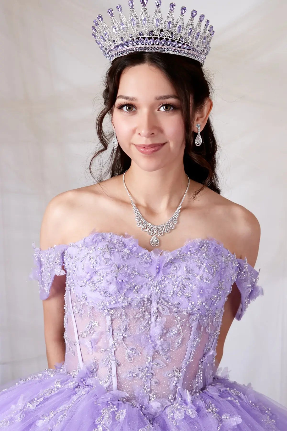 Front Close-Up of a woman wearing of lilac bodice highlighting butterfly appliqué sheer structure and delicate finish
