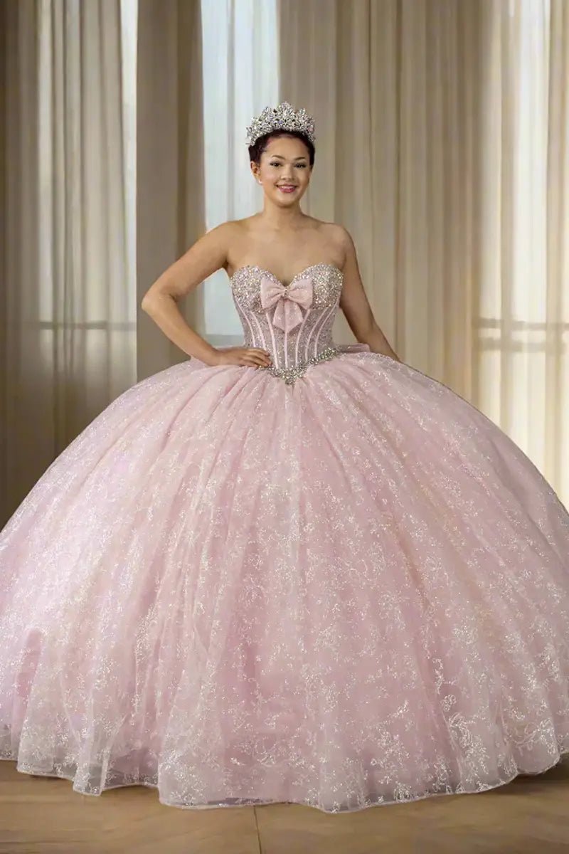 Front-Facing of a woman wearing Bubble pink strapless ball gown with sweetheart neckline beaded bodice floral appliqués and glitter tulle skirt