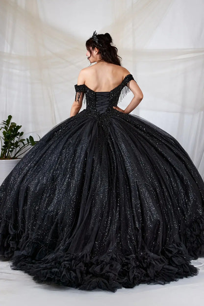 Back-Facing of a woman wearing Black formal gown featuring layered ruffle skirt structured back and flowing silhouette