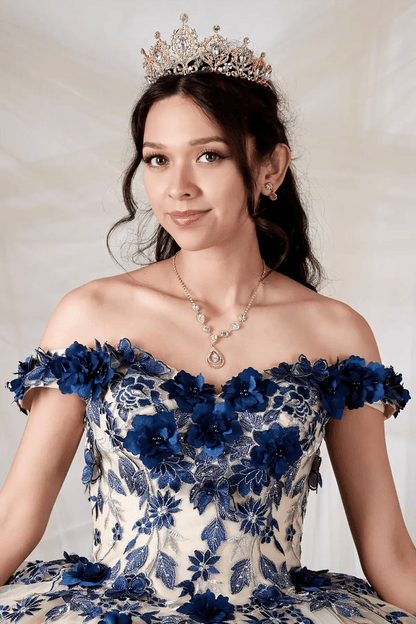 Front Close-Up of a woman wearing of champagne burgundy bodice highlighting 3D floral details off-shoulder neckline and structure