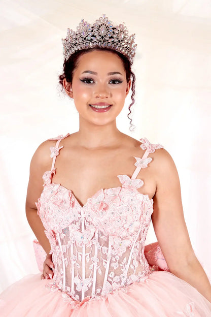 Front Close-Up of a woman wearing of blush bodice highlighting 3D butterfly appliqué sheer neckline and detailed craftsmanship