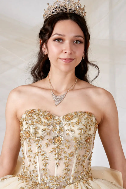 Front Close-Up of a woman wearing champagne bodice highlighting sheer neckline floral appliques and delicate embroidery