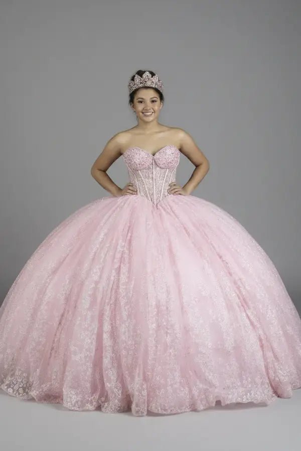 Front-Facing of a woman wearing Bubble pink formal gown featuring fitted back voluminous skirt and soft flowing silhouette