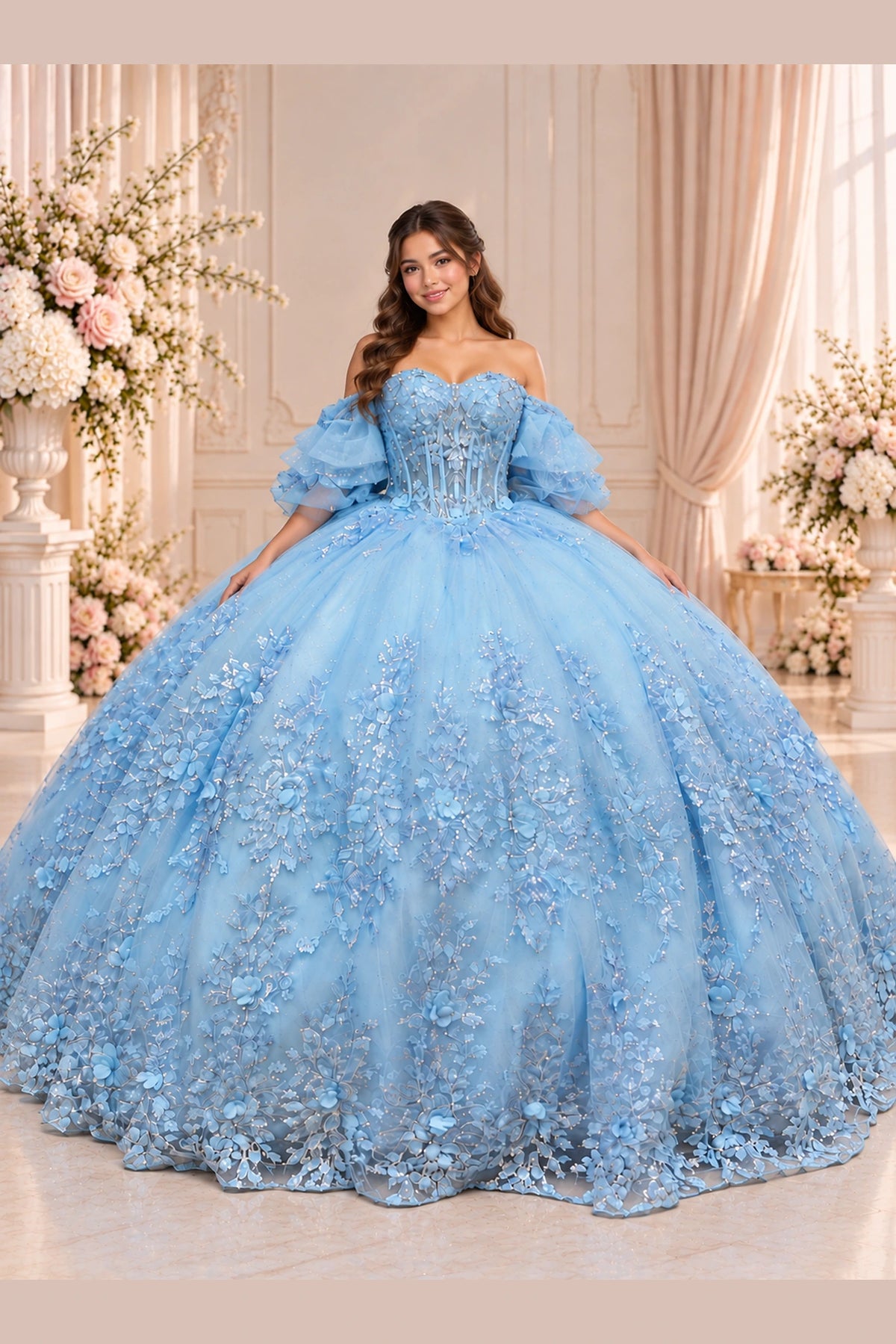 Bahama Blue quinceañera dress with floral appliqués cascading over a full skirt and softly ruffled sleeves.