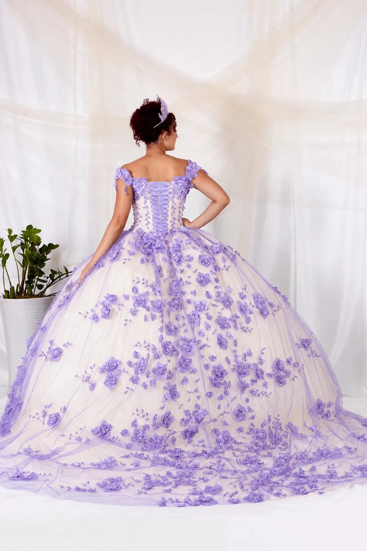 Lilac quinceañera ball gown with 3D floral applique, lace‑up corset and extended train
