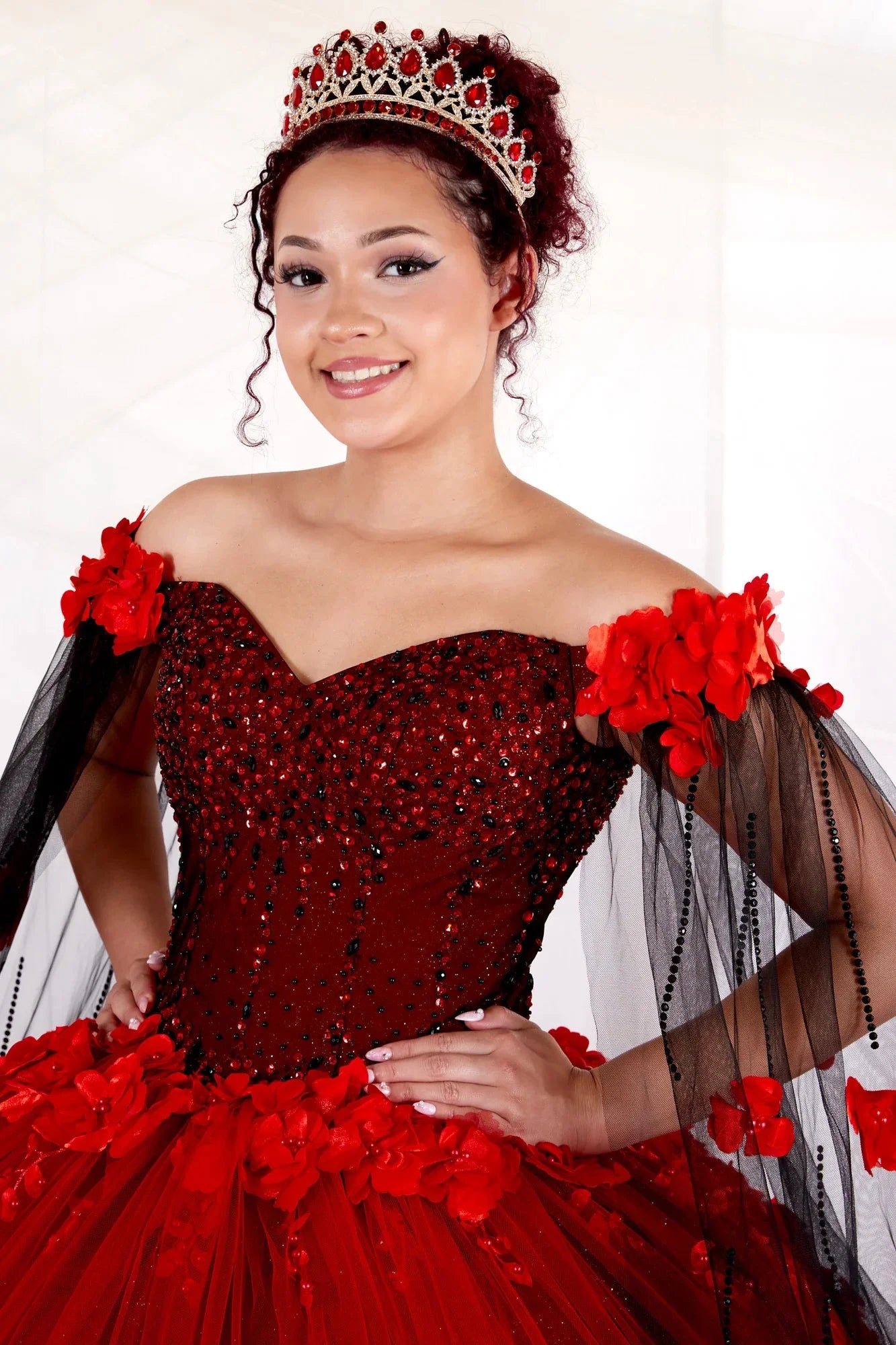 Front Close-Up of a woman wearing red black bodice highlighting floral details two-tone fabric and structured form