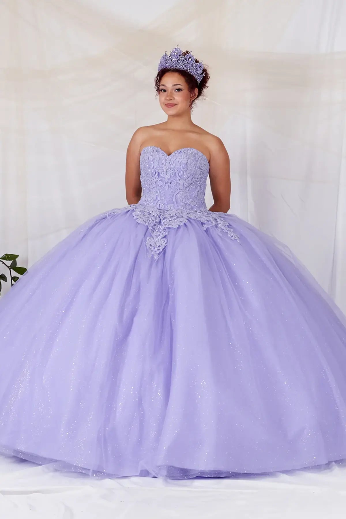 Lilac quinceañera ball gown with removable ruffle sleeves, beaded bodice, glitter tulle skirt and matching cape