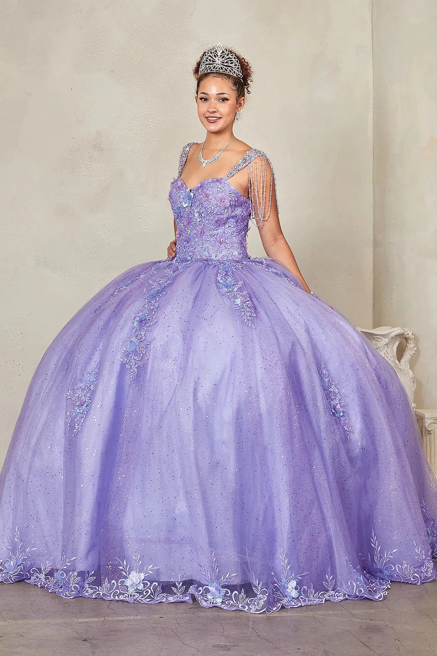 Lilac quinceañera ball gown with sweetheart corset bodice framed by bead-fringed cap sleeves