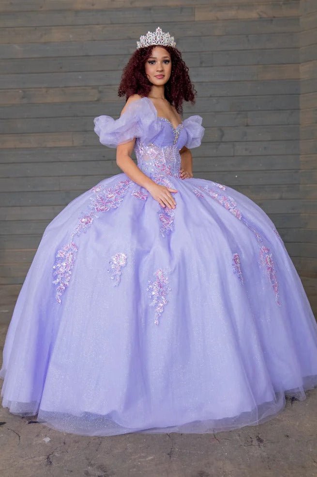 Lilac quinceañera ball gown with illusion corset boning, ruffled straps, puff sleeves and sweep train skirt