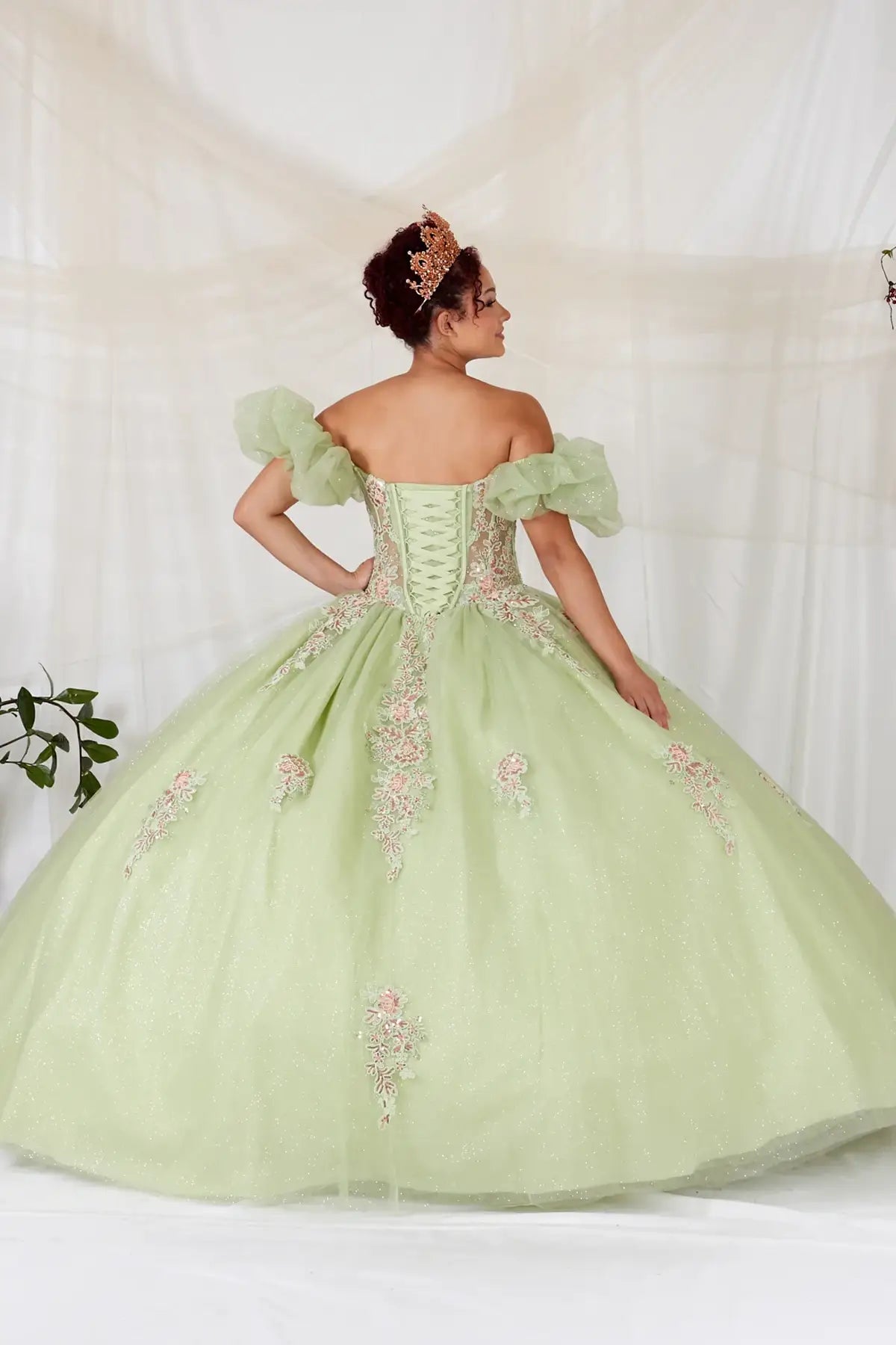 Lime quinceañera ball gown with illusion sweetheart bodice, corset boning, ruffled straps and floor‑length skirt