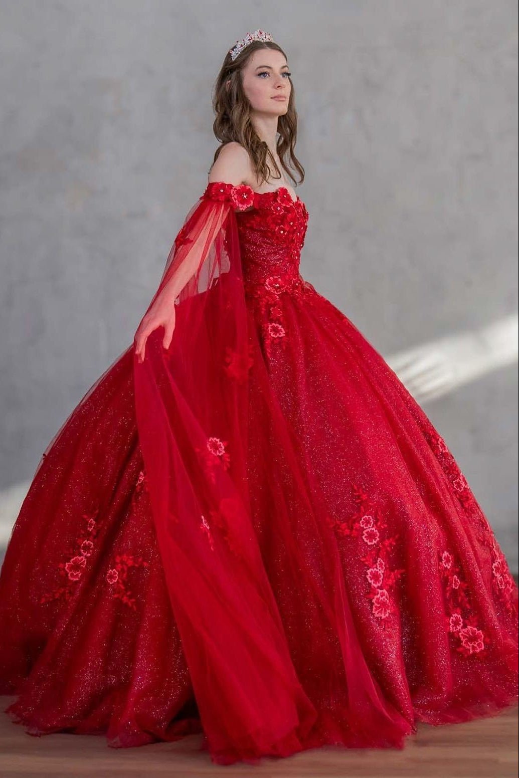 Burgundy quinceañera ball gown with 3D floral applique, detachable cape and glitter tulle skirt