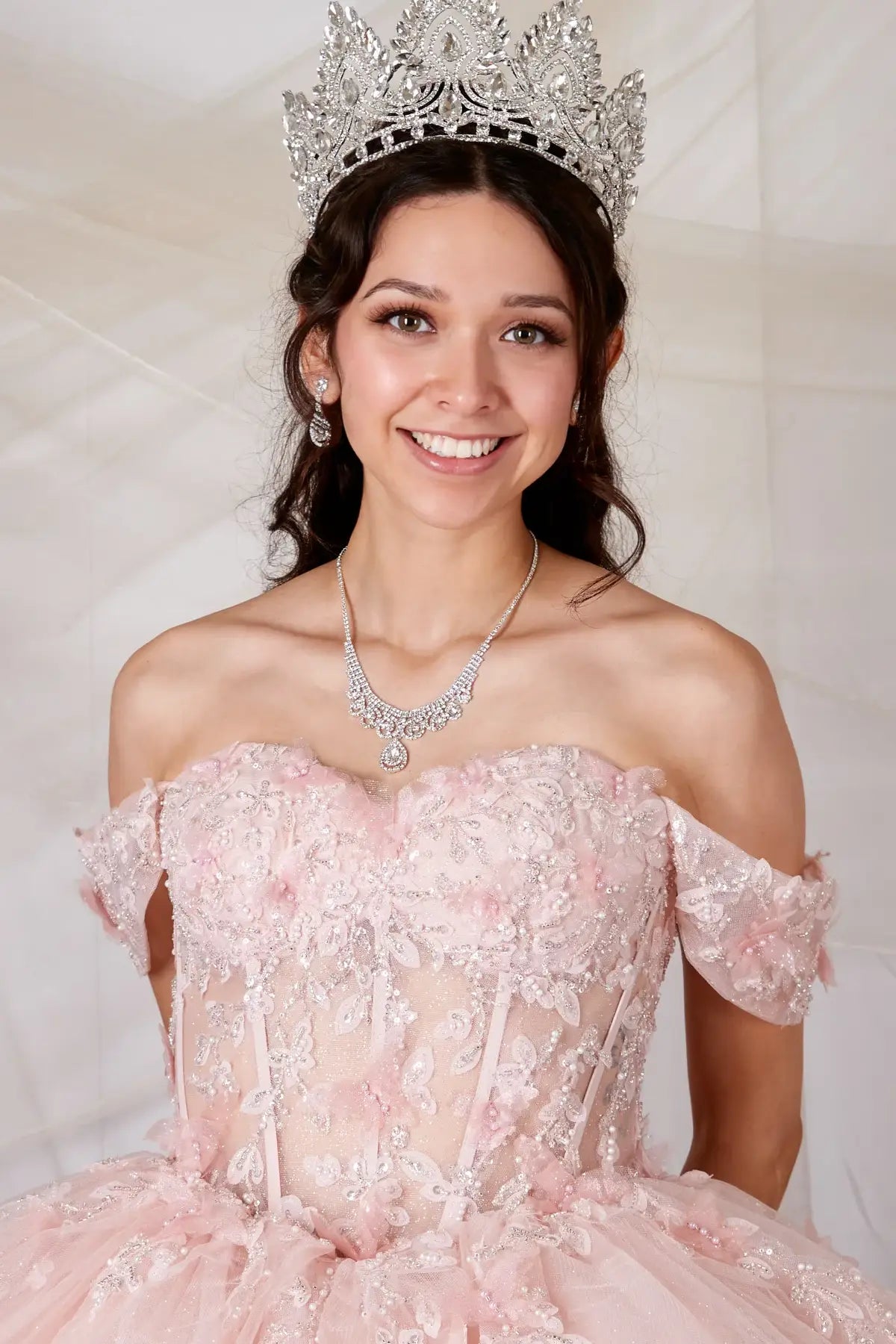 Pink quinceañera ball gown with 3D butterfly applique, sheer bodice and glitter tulle skirt