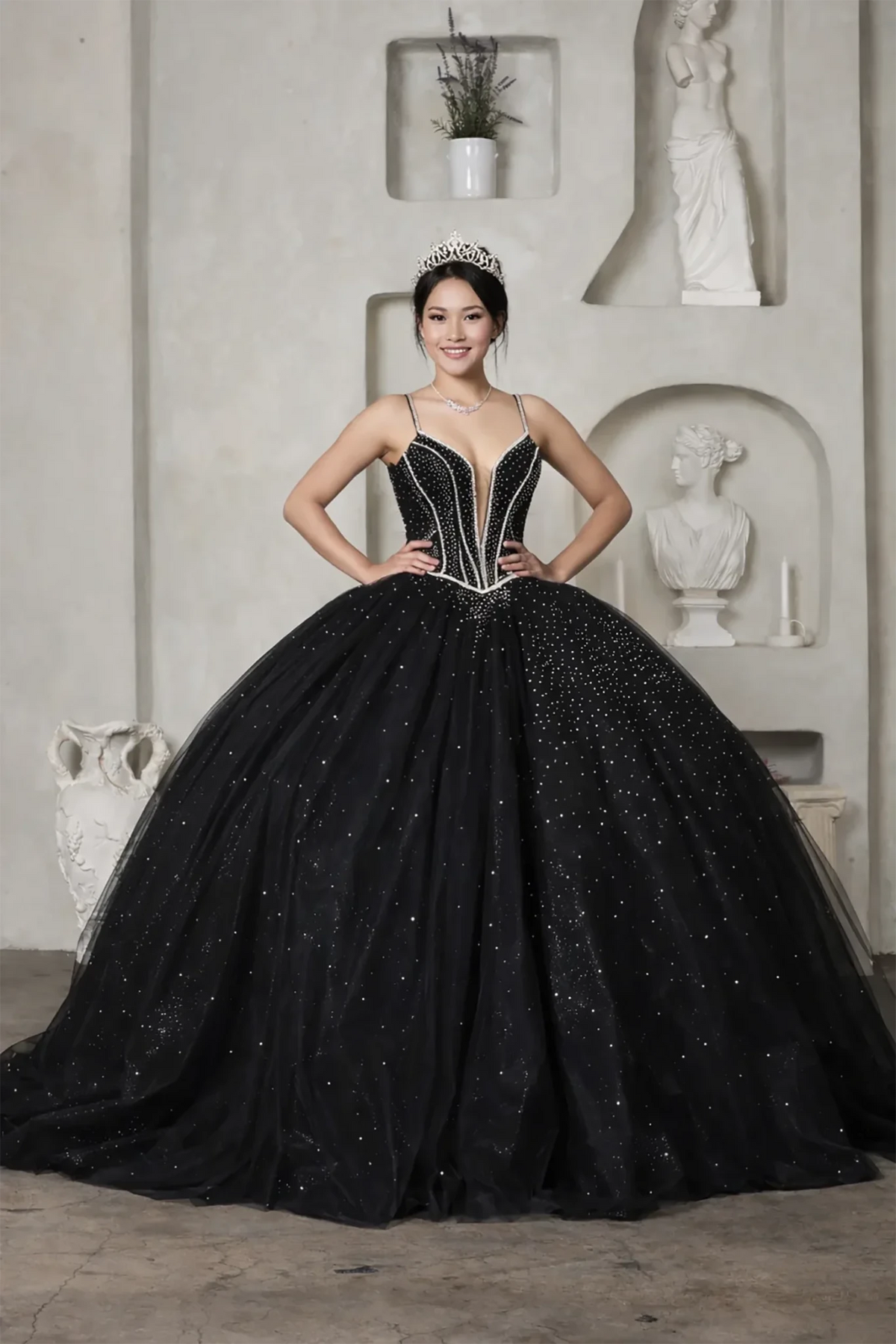 Black quinceañera ball gown with crystal beaded embroidery and glitter tulle skirt