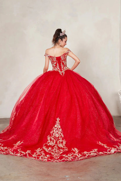Back view of a woman wearing a red quinceañera dress with embroidered lace appliques, off-shoulder design and glitter tulle overlay