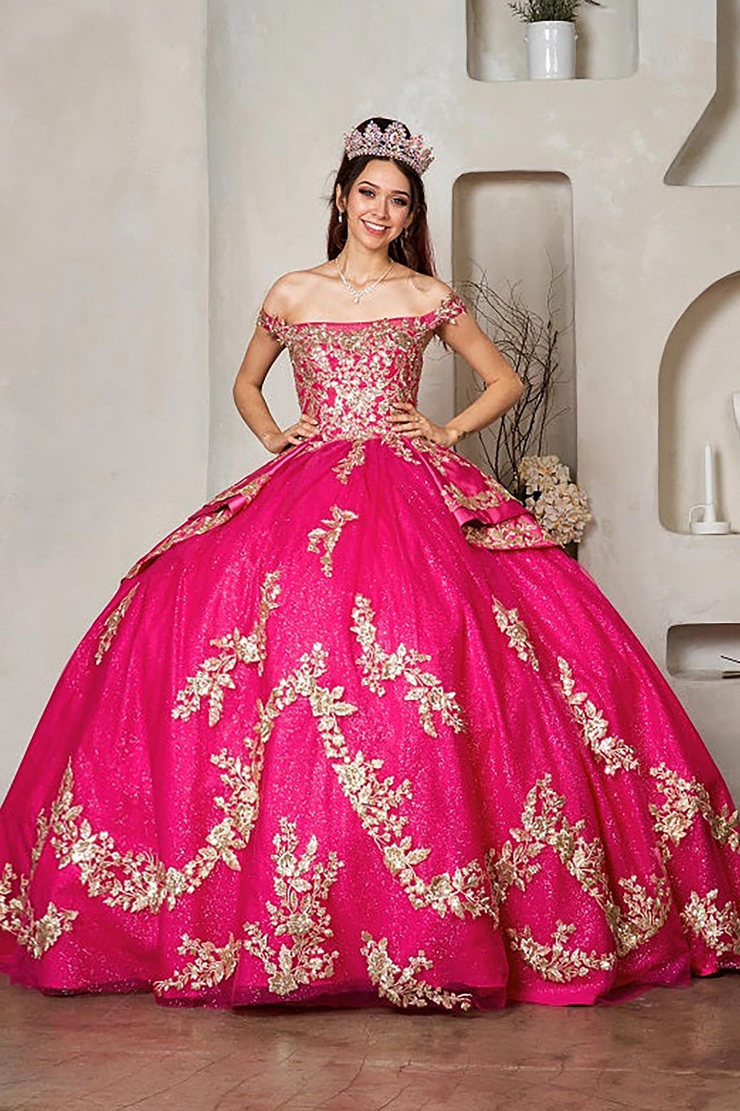 Fuchsia quinceañera ball gown with beaded glitter layered skirt, satin ruffle train and ornate embroidery