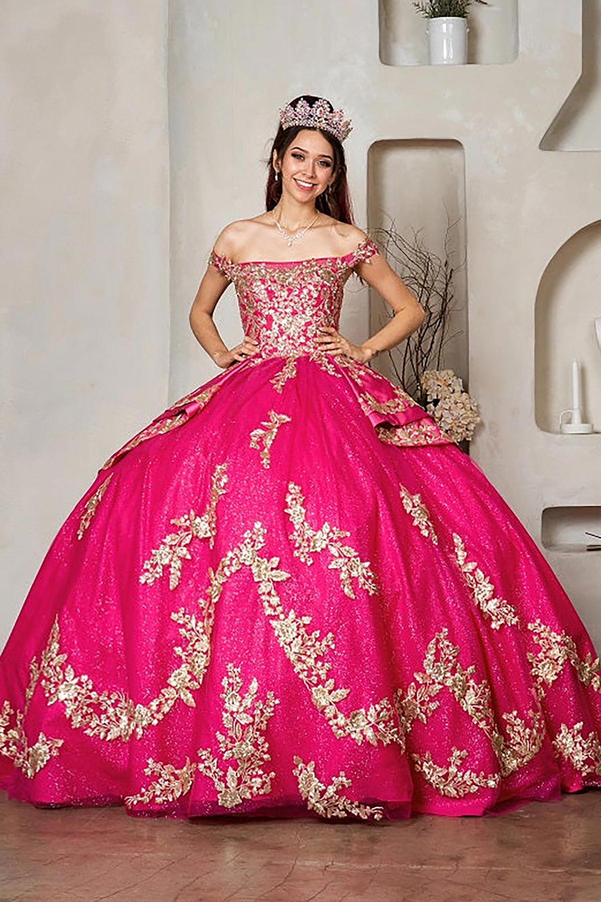 Fuchsia quinceañera ball gown with beaded glitter layered skirt, satin ruffle train and ornate embroidery