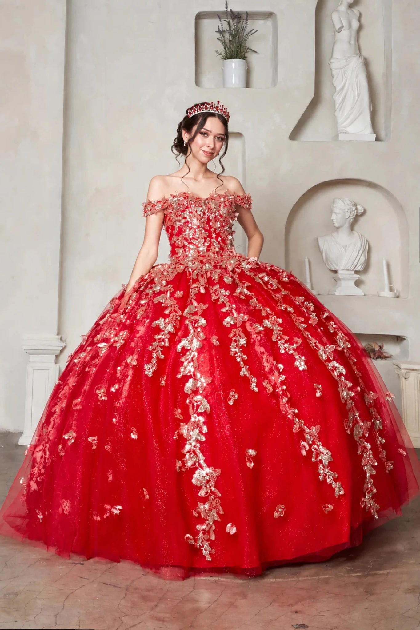 red quinceanera ball gown with gold floral embroidery and off-the-shoulder detailing
