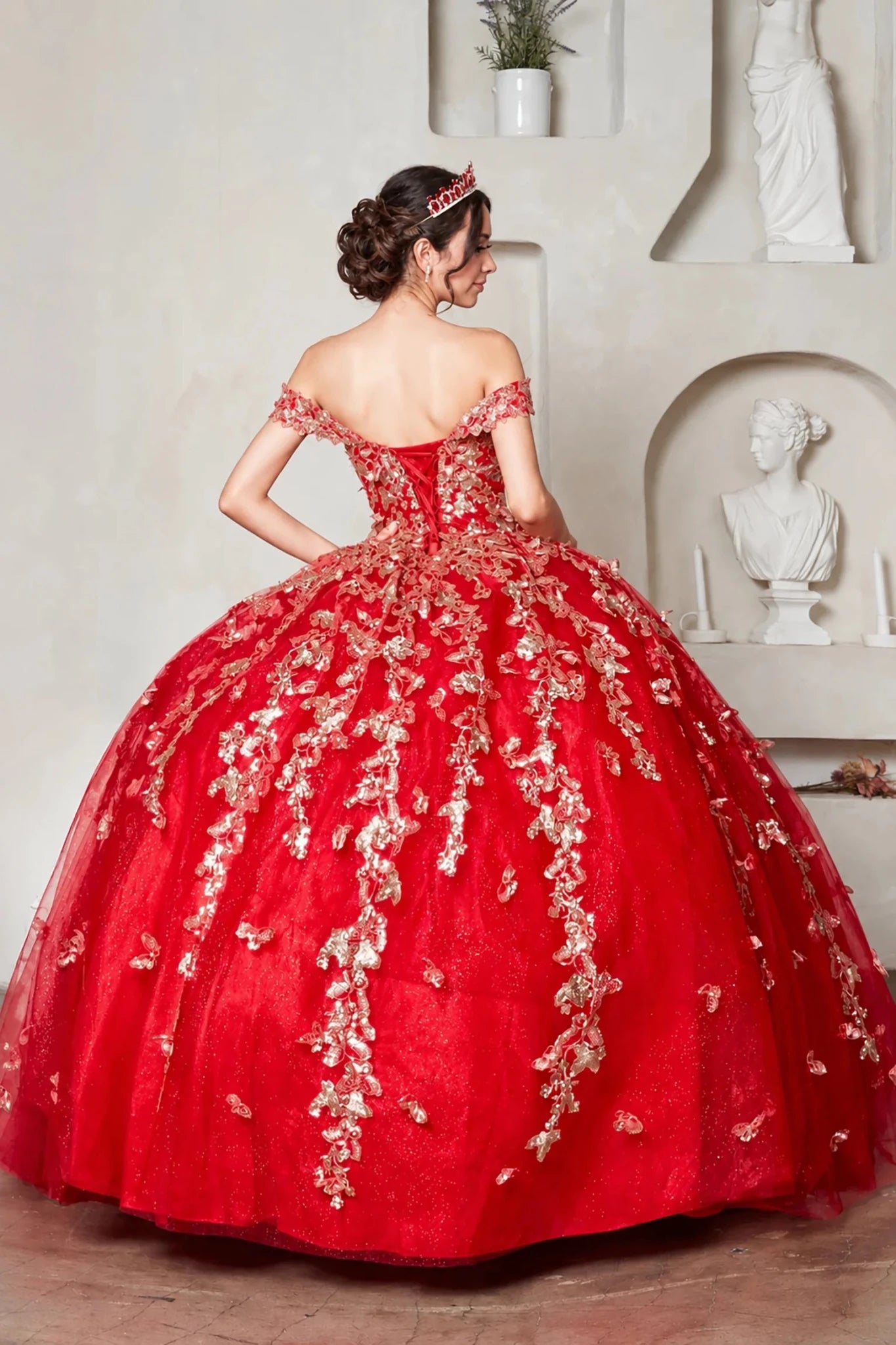 red quinceanera ball gown with gold floral embroidery and lace up back