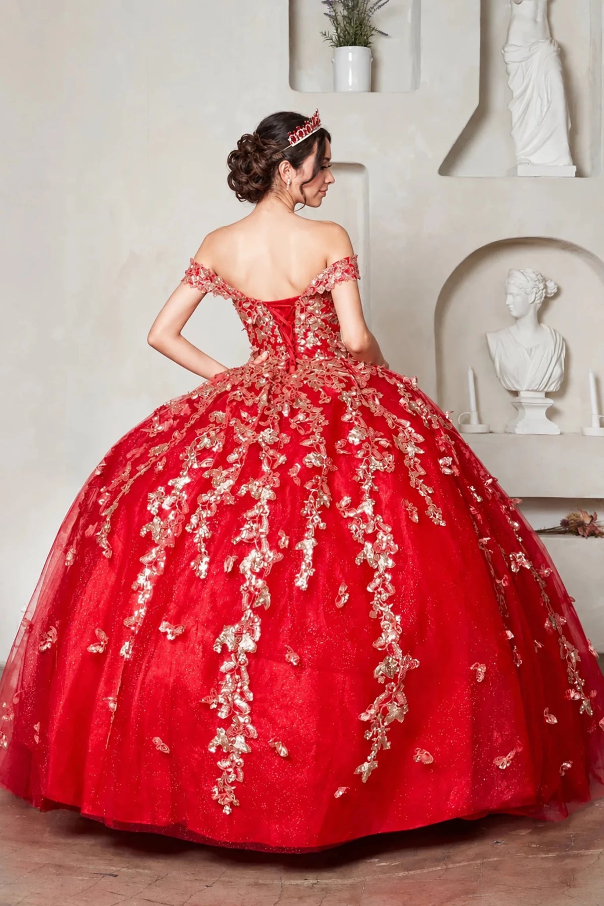 red quinceanera ball gown with gold floral embroidery and lace up back
