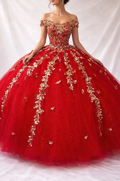 Textured details appear across red quinceanera ball gown with gold floral embroidery over all.