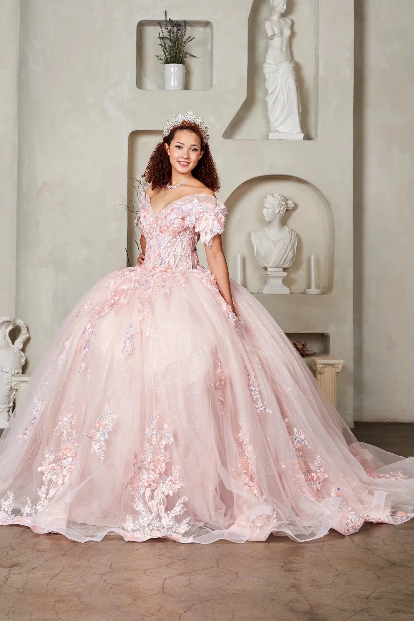 Blush quinceañera ball gown with floral applique, crystal beaded bodice and glitter tulle skirt