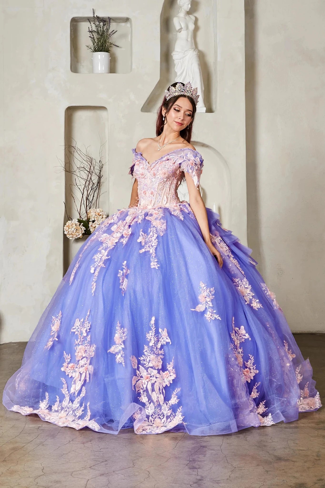 Lilac quinceañera ball gown with blush floral embroidery and crystal beaded bodice