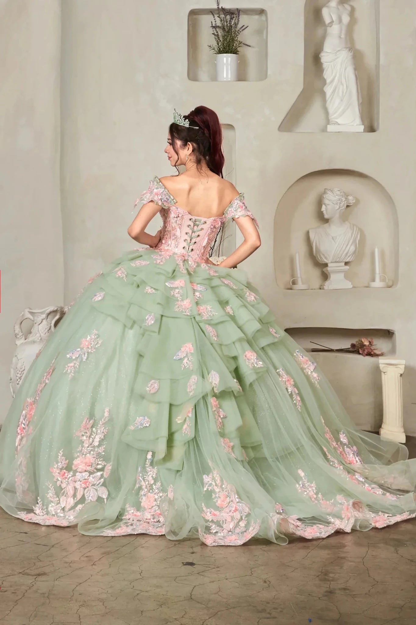 Sage quinceañera ball gown with blush 3D floral applique, crystal beaded bodice and ruffled skirt